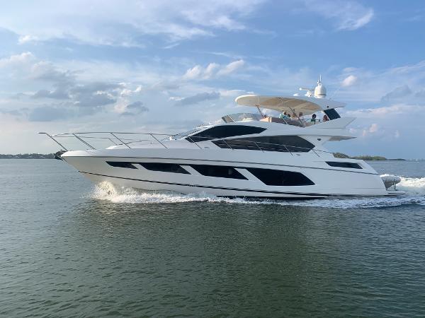 Slide: The Image of 2016 Sunseeker Manhattan 65 yacht cruising on open water. - 0