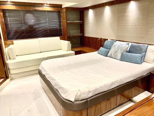 Slide: The Image of Luxurious bedroom interior of 2016 Sunseeker Manhattan 65 yacht with bed and sofa. - 13