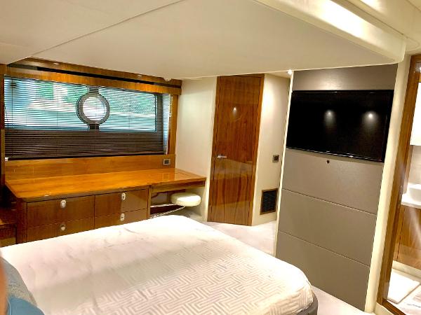 Slide: The Image of Luxurious bedroom interior of 2016 Sunseeker Manhattan 65 yacht with modern furnishings. - 14