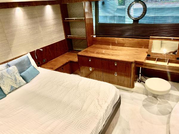 Slide: The Image of Luxurious bedroom interior of 2016 Sunseeker Manhattan 65 yacht with wooden furnishings. - 15