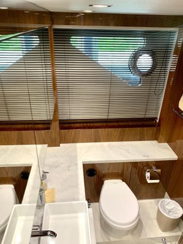 Slide: The Image of Luxurious bathroom in 2016 Sunseeker Manhattan 65 yacht with modern fixtures. - 16