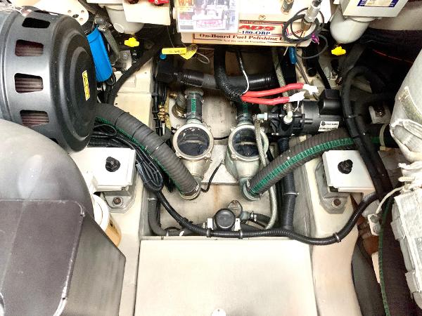 Slide: The Image of Engine room of a 2016 Sunseeker Manhattan 65 yacht, showcasing mechanical components. - 25