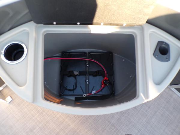 Slide: The Image of Battery compartment of 2024 Sun Tracker FISHIN' BARGE® 22 DLX pontoon boat. - 13