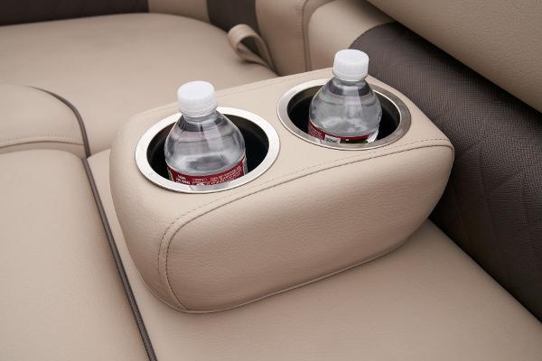 Slide: The Image of 2024 Sun Tracker Fishin' Barge 22 XP3 cup holders with water bottles. - 34