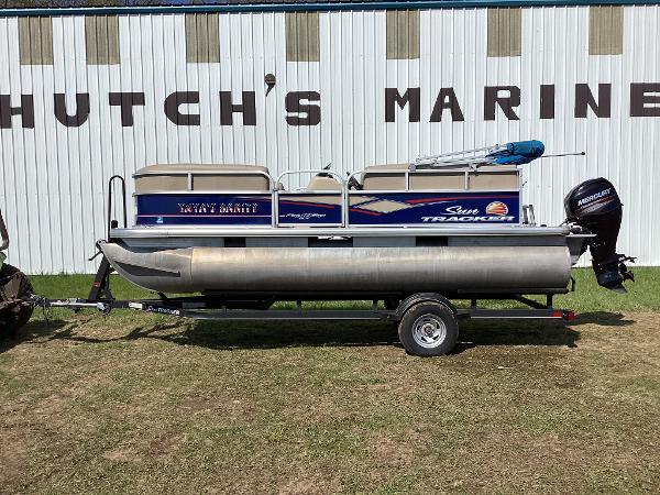 Slide: The Image of 2018 Sun Tracker Party Barge 18 DLX pontoon boat at Hutch's Marine. - 2