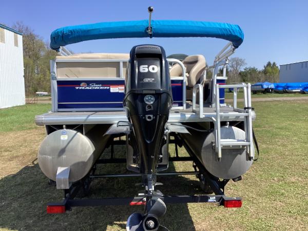Slide: The Image of 2018 Sun Tracker Party Barge 18 DLX pontoon boat with 60 HP engine, blue canopy. - 3