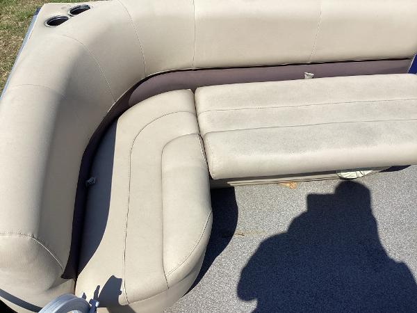 Slide: The Image of 2018 Sun Tracker Party Barge 18 DLX pontoon boat seating area with cup holders. - 6