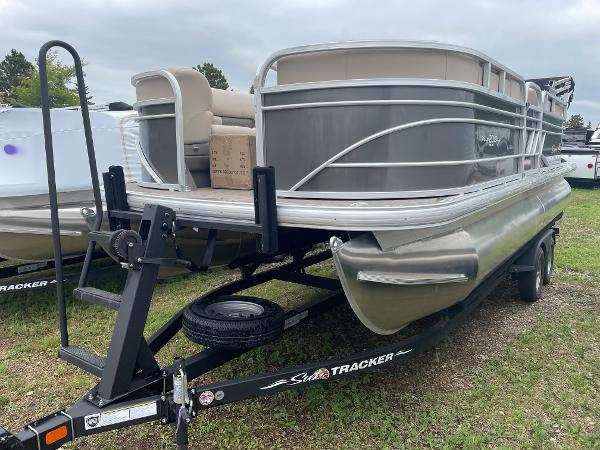 Slide: The Image of 2023 Sun Tracker Party Barge 20 DLX pontoon boat on trailer. - 0
