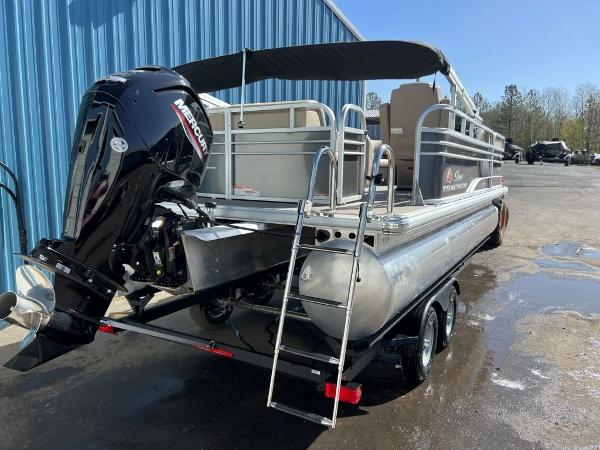 Slide: The Image of 2023 Sun Tracker PARTY BARGE® 20 DLX pontoon boat with Mercury outboard motor. - 3