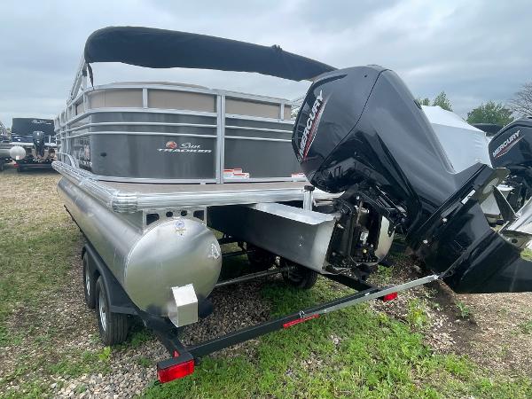 Slide: The Image of 2023 Sun Tracker Party Barge 20 DLX with Mercury outboard motor on trailer. - 3