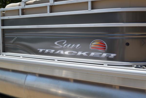 Slide: The Image of 2024 Sun Tracker Party Barge 20 DLX pontoon boat side view. - 0