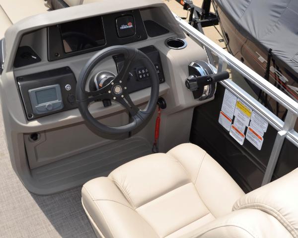 Slide: The Image of 2024 Sun Tracker Party Barge 20 DLX helm with steering wheel and control panel. - 1