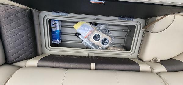 Slide: The Image of Storage compartment in 2024 Sun Tracker PARTY BARGE® 20 DLX with accessories. - 10