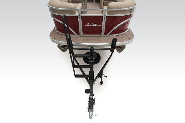 Slide: The Image of 2024 Sun Tracker Party Barge 20 DLX pontoon boat on trailer, rear view. - 11