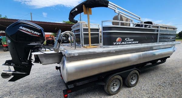 Slide: The Image of 2024 Sun Tracker PARTY BARGE® 20 DLX pontoon boat with Mercury outboard motor. - 12