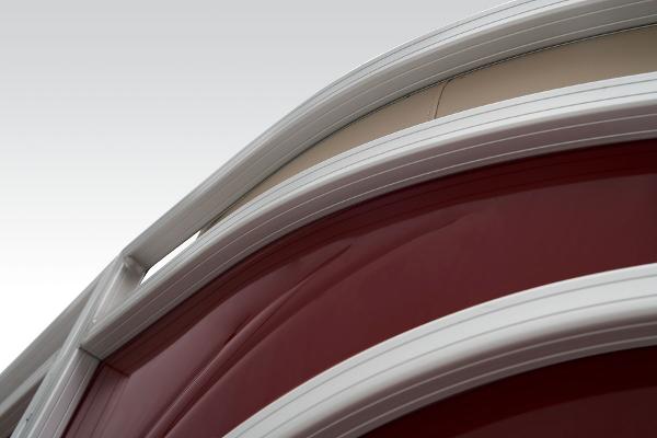 Slide: The Image of Close-up of 2024 Sun Tracker Party Barge 20 DLX red exterior detailing. - 16