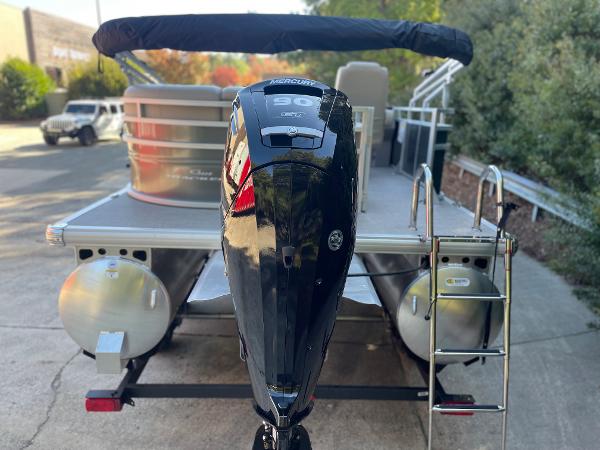 Slide: The Image of 2024 Sun Tracker Party Barge 20 DLX pontoon boat with Mercury 90 engine. - 2
