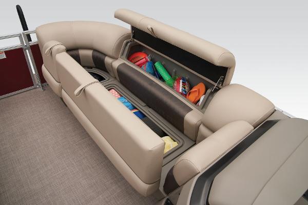 Slide: The Image of 2024 Sun Tracker Party Barge 20 DLX storage compartments with various items. - 27