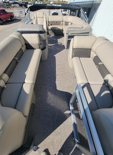 Slide: The Image of 2024 Sun Tracker Party Barge 20 DLX interior with spacious seating and modern design. - 3