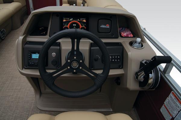 Slide: The Image of 2024 Sun Tracker Party Barge 20 DLX helm with steering wheel and control panel. - 35