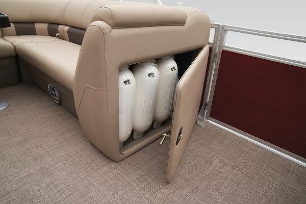 Slide: The Image of Sun Tracker Party Barge 20 DLX 2024 storage compartment with fenders. - 40