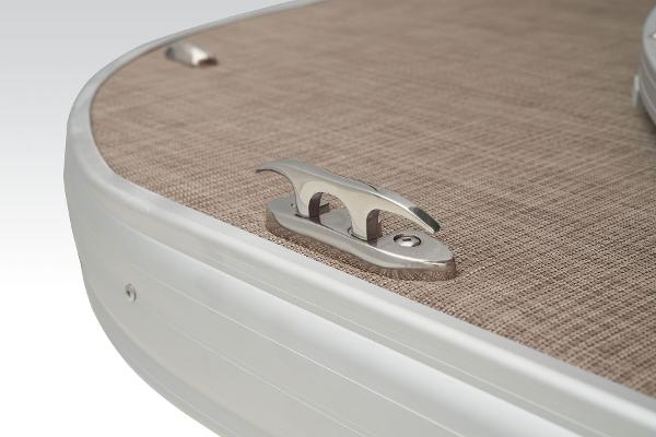 Slide: The Image of Close-up of 2024 Sun Tracker Party Barge 22 XP3 deck cleat and flooring. - 17