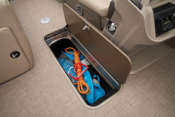 Slide: The Image of Under-seat storage compartment in 2024 Sun Tracker Party Barge 22 XP3. - 23