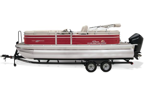 Slide: The Image of 2024 Sun Tracker Party Barge 22 XP3 pontoon boat on trailer, side view. - 3