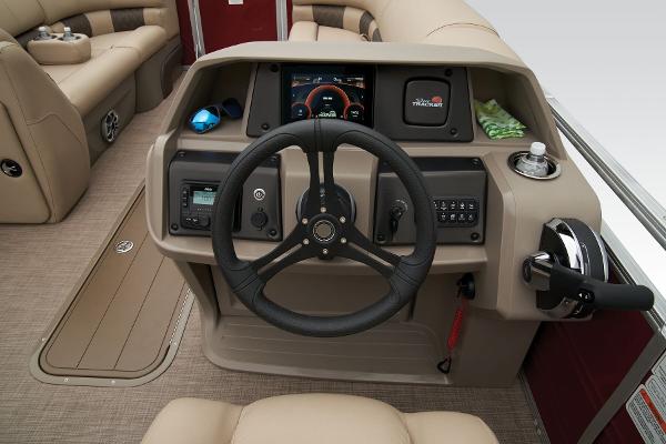 Slide: The Image of 2024 Sun Tracker Party Barge 22 XP3 helm with steering wheel and control panel. - 31