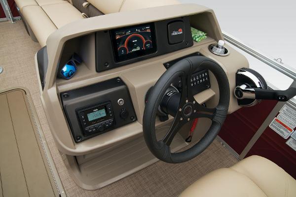 Slide: The Image of 2024 Sun Tracker Party Barge 22 XP3 helm with steering wheel and control panel. - 32
