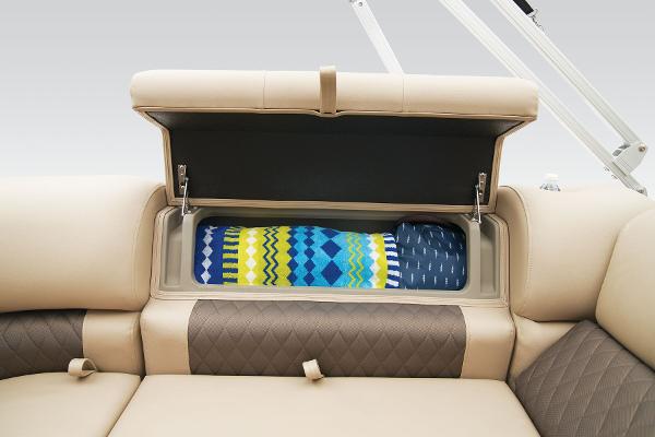 Slide: The Image of 2024 Sun Tracker Party Barge 22 XP3 storage compartment with colorful blanket. - 46