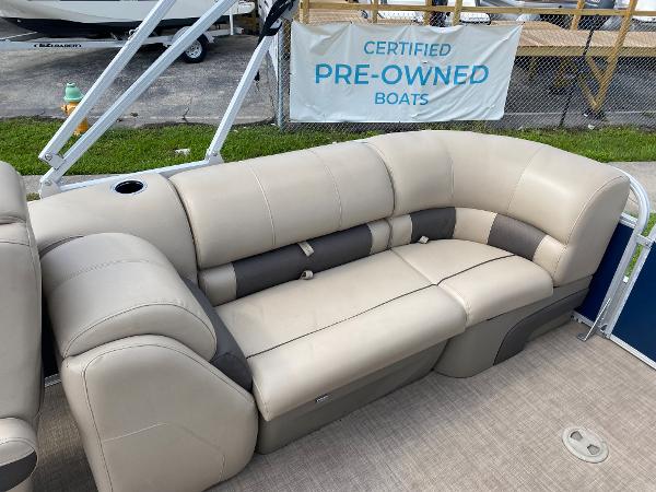 Slide: The Image of 2021 Sun Tracker Party Barge 24 DLX interior seating, certified pre-owned boat. - 11