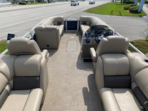 Slide: The Image of 2021 Sun Tracker Party Barge 24 DLX pontoon boat with spacious seating and modern helm. - 14