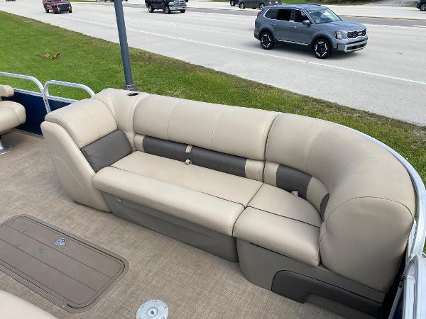 Slide: The Image of 2021 Sun Tracker Party Barge 24 DLX with beige seating and spacious deck. - 8