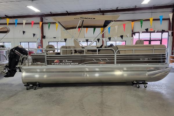 Slide: The Image of 2023 Sun Tracker SportFish 20 DLX pontoon boat in showroom. - 0