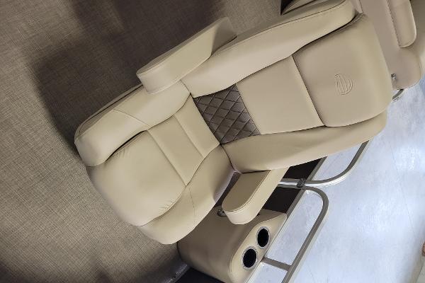 Slide: The Image of 2023 Sun Tracker SportFish 20 DLX boat seat with cup holders. - 7