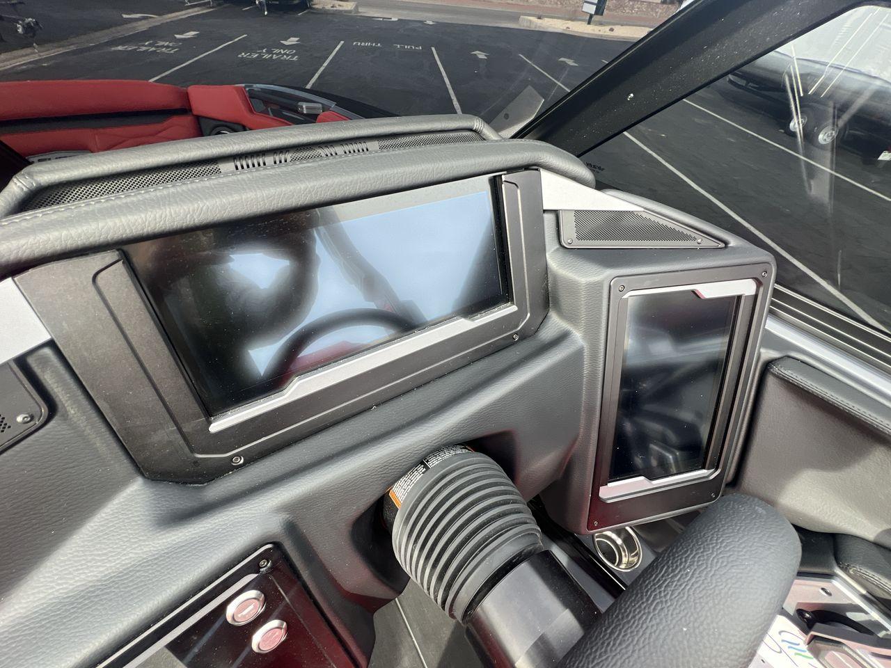 Slide: The Image of 2025 Supra SA dashboard with dual touchscreen displays and modern controls. - 15