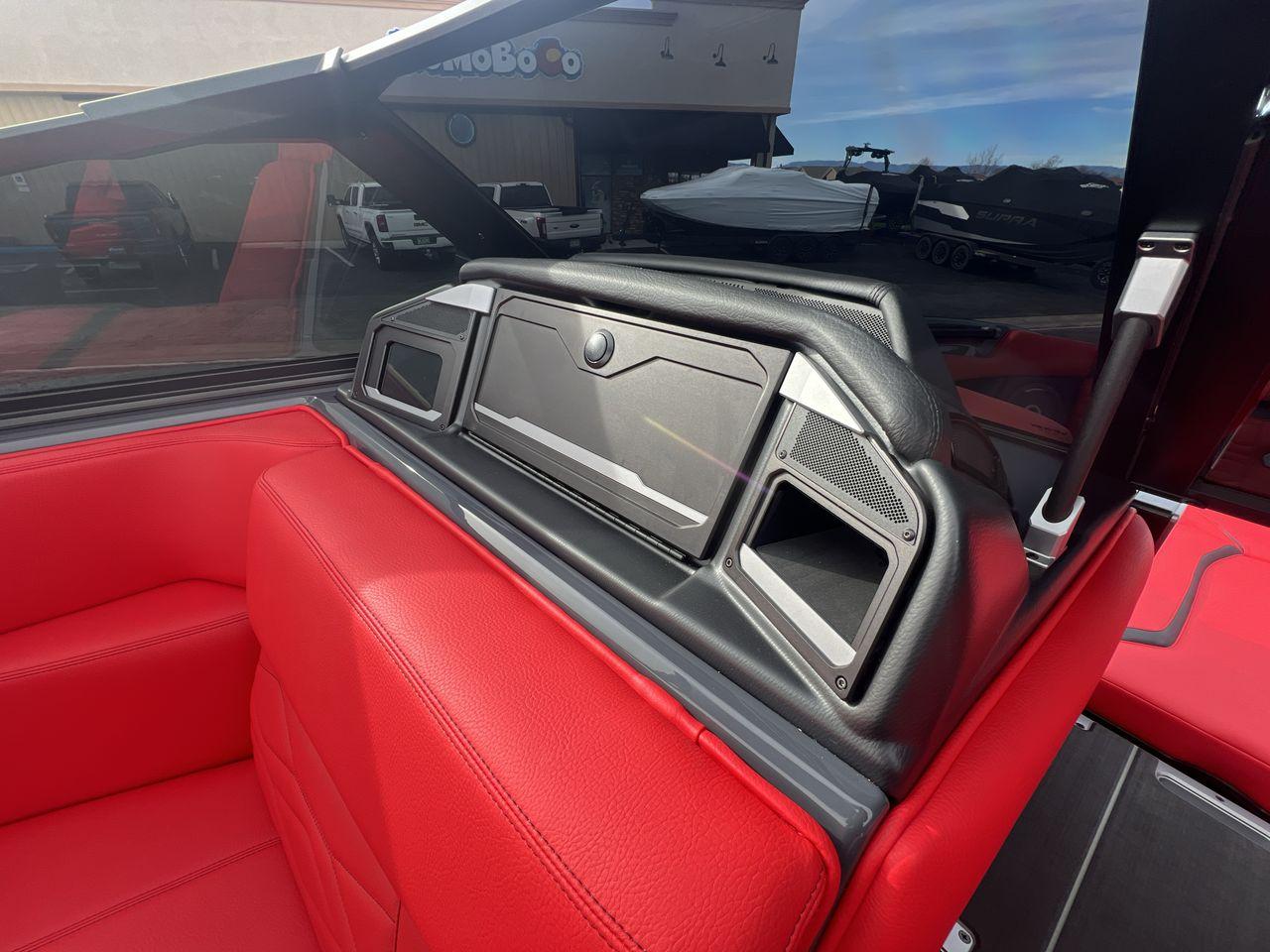 Slide: The Image of 2025 Supra SA interior with red leather seats and sleek dashboard design. - 17
