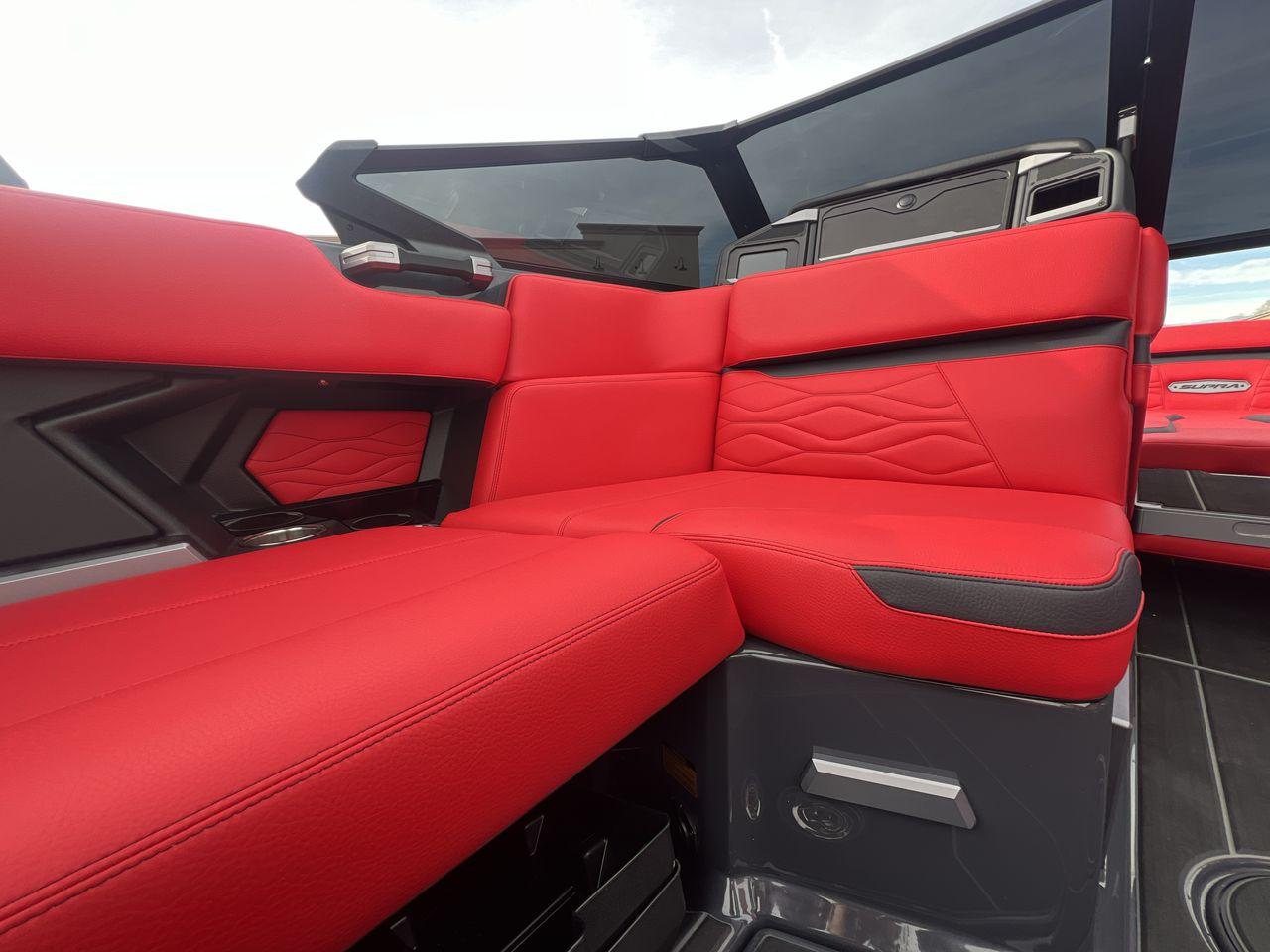 Slide: The Image of 2025 Supra SA boat interior with luxurious red seating and modern design. - 18