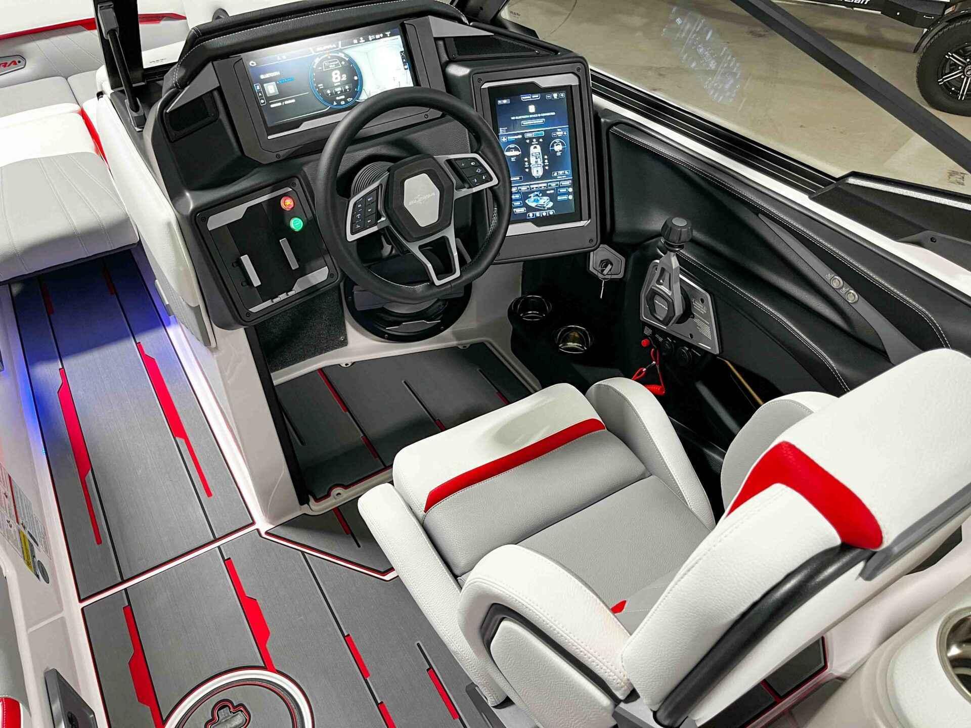 Slide: The Image of 2024 Supra SA400 boat cockpit with advanced controls and modern dashboard. - 19