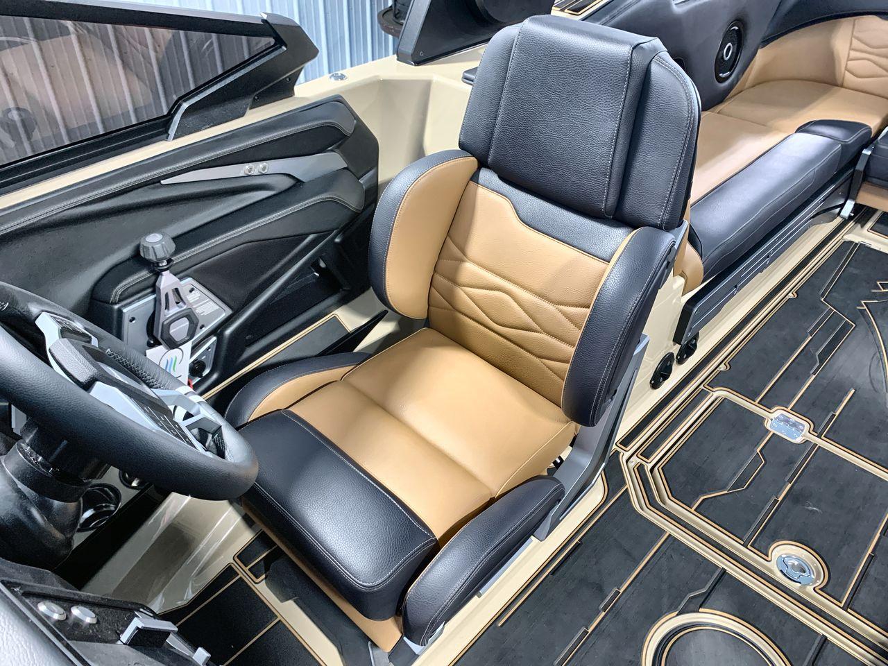 Slide: The Image of 2025 Supra SE interior with luxurious tan and black seating, modern controls, and sleek design. - 12