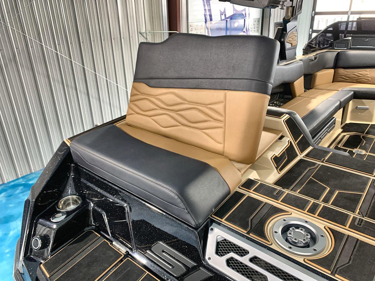 Slide: The Image of 2025 Supra SE boat interior with luxurious seating and modern design. - 18