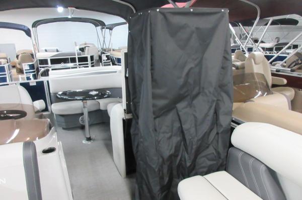 Slide: The Image of 2023 Sylvan 820 Mirage Cruise RE interior with seating and table. - 3