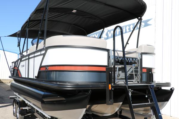 Slide: The Image of 2025 Sylvan L3 DLZ Bar Tri-Toon boat with canopy, rear view. - 12