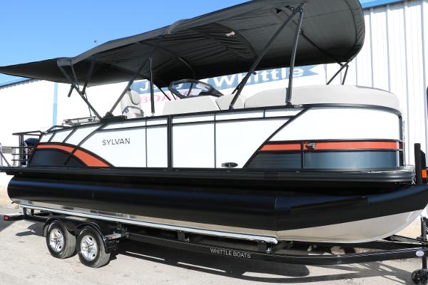 Slide: The Image of 2025 Sylvan L3 DLZ Bar Tri-Toon boat on trailer with black canopy. - 16