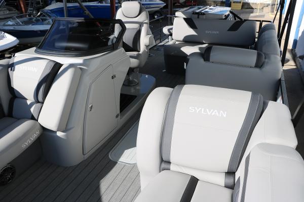 Slide: The Image of 2025 Sylvan L3 DLZ Bar Tri-Toon interior with luxurious seating and modern design. - 20