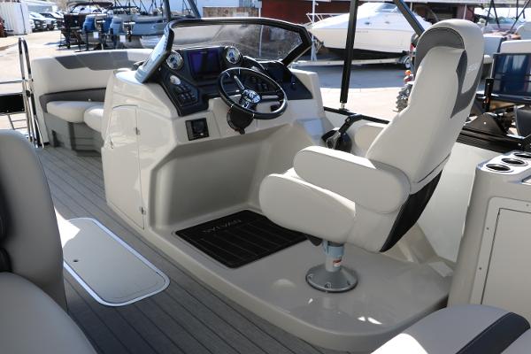 Slide: The Image of 2025 Sylvan L3 DLZ Bar Tri-Toon boat interior with modern helm and comfortable seating. - 30