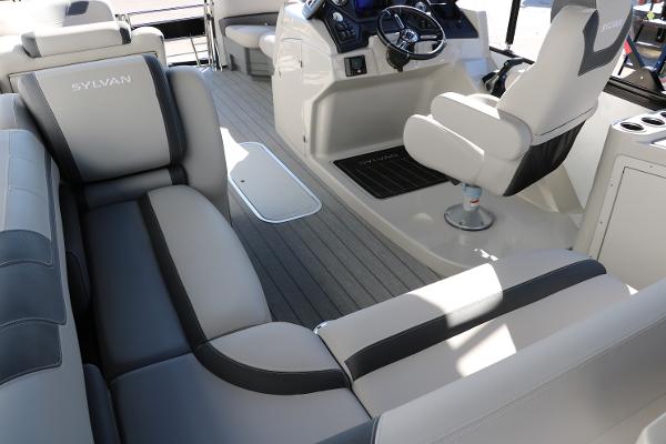 Slide: The Image of 2025 Sylvan L3 DLZ Bar Tri-Toon interior with luxurious seating and modern helm. - 31