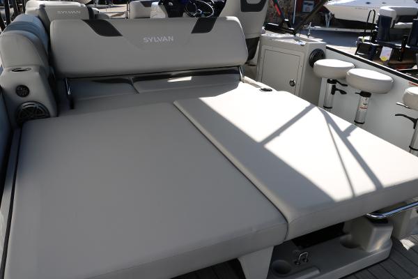 Slide: The Image of 2025 Sylvan L3 DLZ Bar Tri-Toon boat interior with spacious seating and modern design. - 33