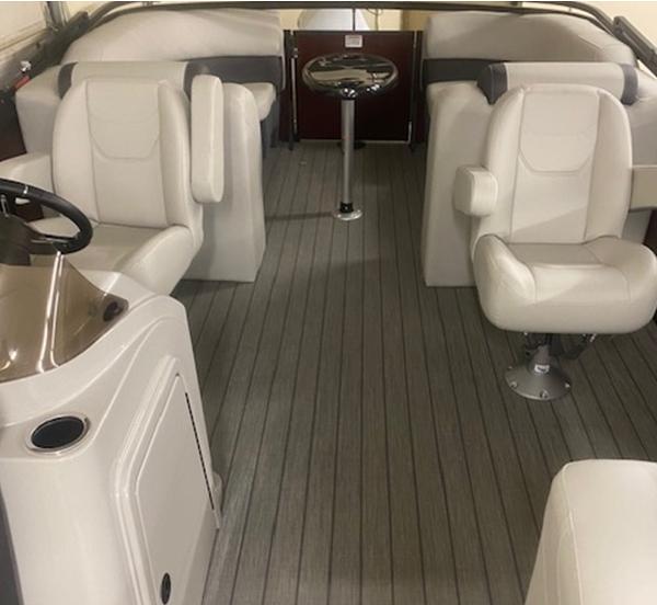 Slide: The Image of 2024 Sylvan Mirage 8522 LZ pontoon boat interior with plush seating and modern design. - 4
